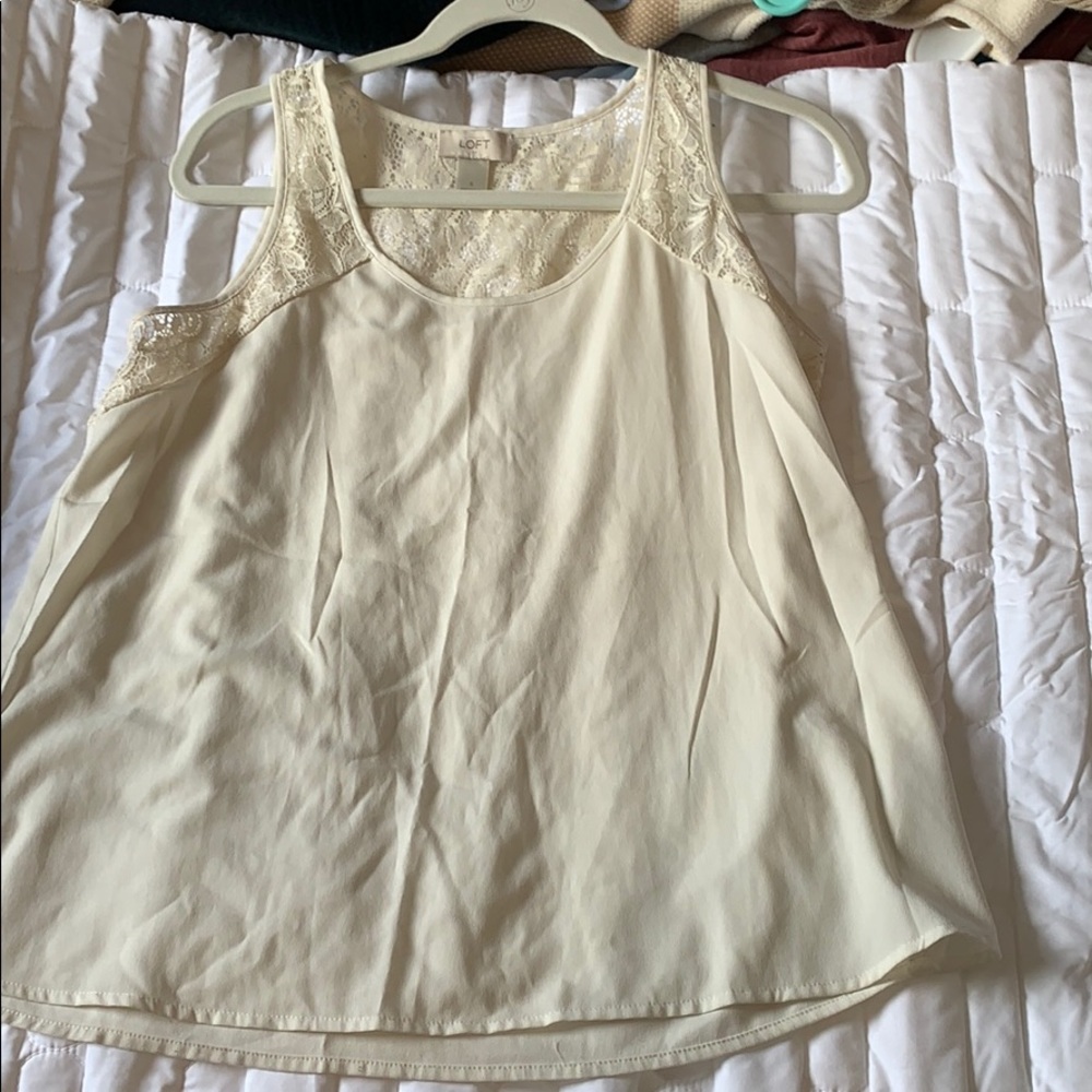 A white and lace blouse from loft size small